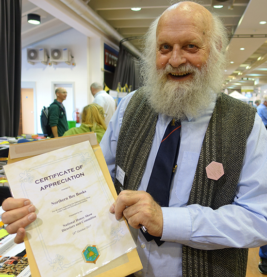 Jerry Burbidge from Northern Bee Books receives a certificate of appreciation for more than 40 years of support for the National Honey Show
